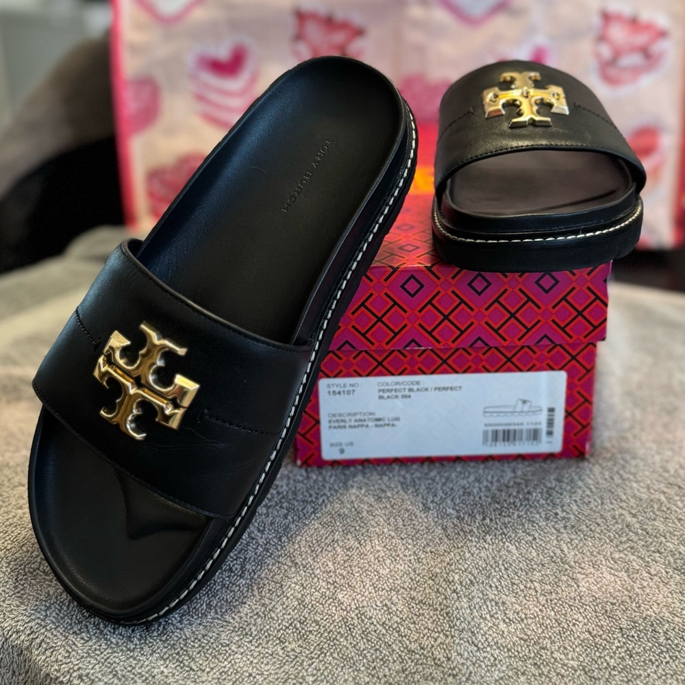 Tory Burch Black and Gold Sandals with Luxurious Logo